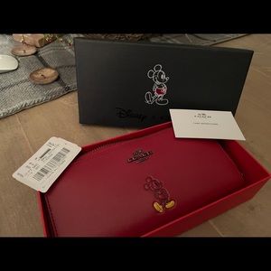 Rare, Coach new with tags Mickey Mouse zipped wallet